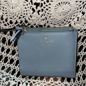 Kate Spade light blue pebbled leather 2 zippered Bifold Wallet with 8 Card Slots